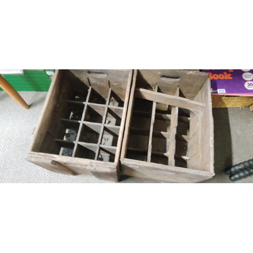 216 - 2 antique wooden bottle crates.