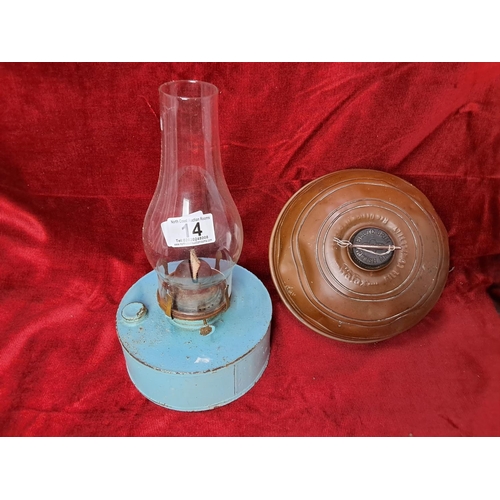 14 - A vintage oil lamp & copper hot water bottle.