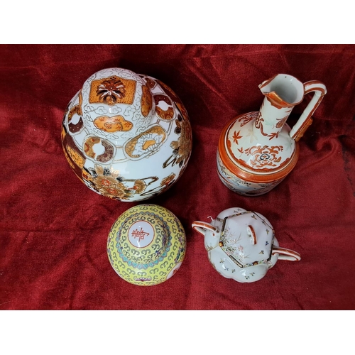 22 - A collection of 4 pieces of decorative Chinese/ Japanese ceramics, to include 2 Ginger jars, a sugar... 