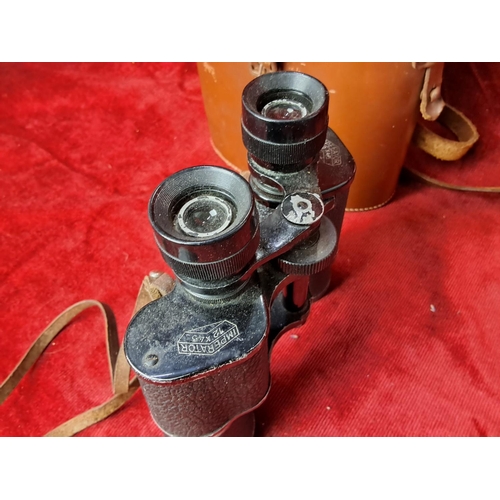 30 - A cased set of vintage Imperator binoculars.