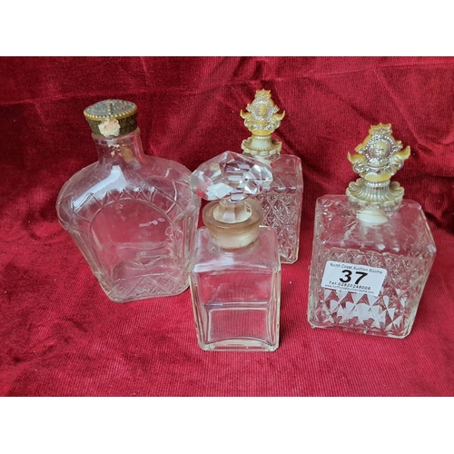 37 - A collection of 4 antique/ vintage glass bottles.