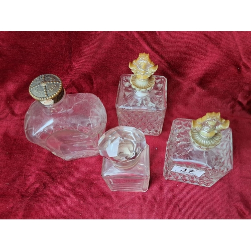 37 - A collection of 4 antique/ vintage glass bottles.