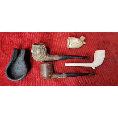 54 - A collection of vintage/ antique pipes & more.