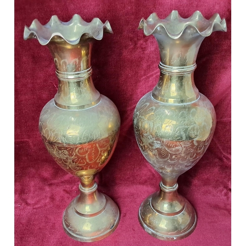 56 - A pair of decorative vintage Indian brass vases, each measuring approx 35cm tall.