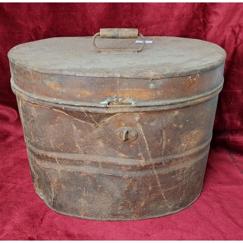 57 - An antique/ vintage metal hat box.