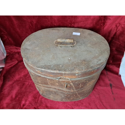 57 - An antique/ vintage metal hat box.