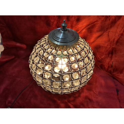 61 - A decorative beaded table lamp/ lantern.