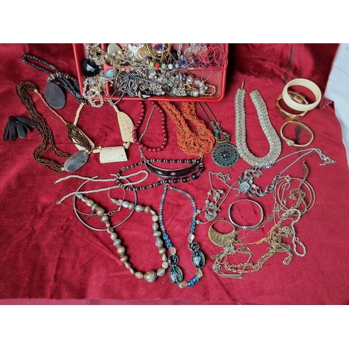 64 - An assortment of vintage costume jewellery etc.