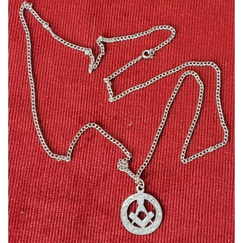 96 - A vintage Sterling Silver hand engraved Masonic pendant on chain. Weighing 13.50 grams.