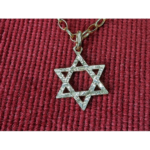 98 - A 9ct Gold Star of David pendant on chain, weighing 3.36 grams.