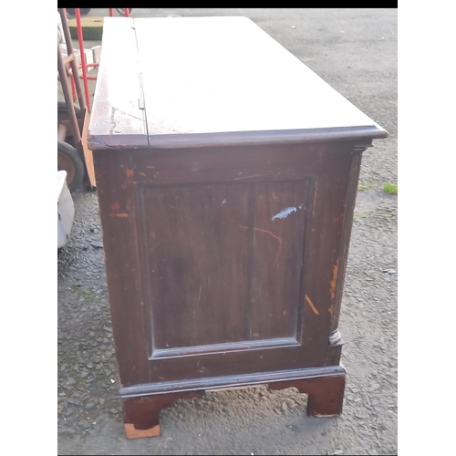 112 - A stunning antique oak coffer/ blanket box with panelled front, measuring 70cm x 53cm x 113cm.