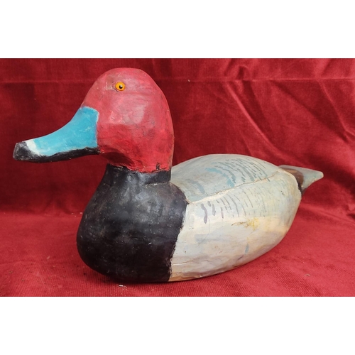 114 - A hand carved & painted duck decoy, signed to base.