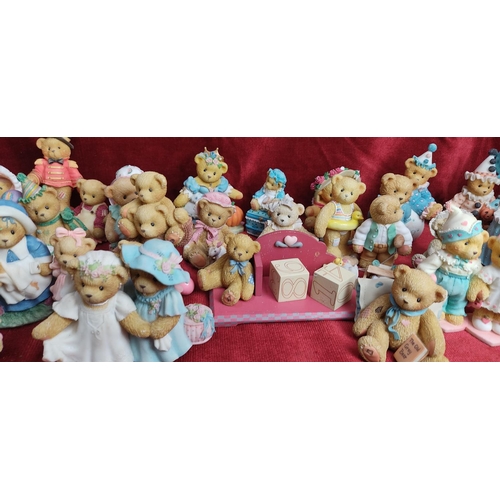 168 - A large collection of decorative 'Cherished Teddies' bear figures.