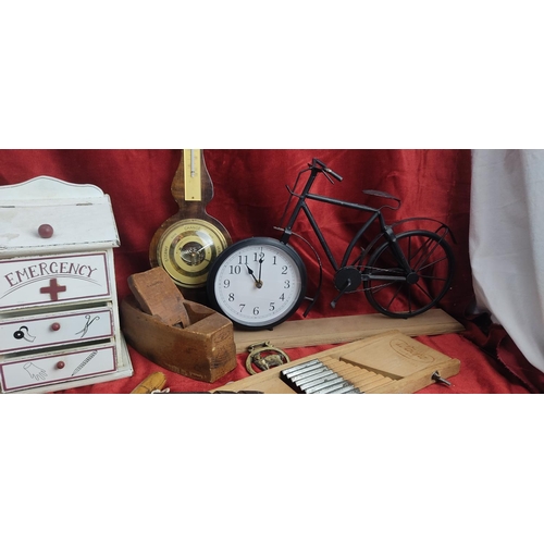 197 - An assortment of various items to include wood cased barometer, bicycle clock & more.