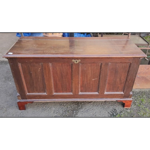 112 - A stunning antique oak coffer/ blanket box with panelled front, measuring 70cm x 53cm x 113cm.