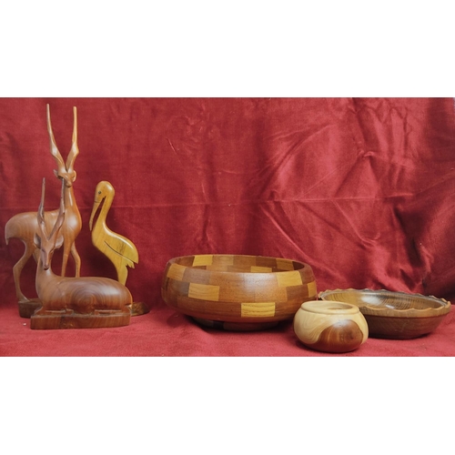 122 - A collection of vintage/ Mid Century carved wooden pieces.