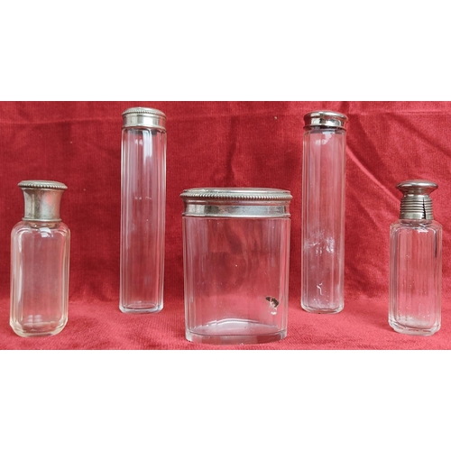 125 - A set of 5 vintage glass dressing table bottles.