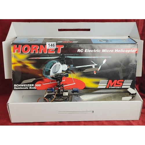 146 - A boxed Hornet remote control micro helicopter.