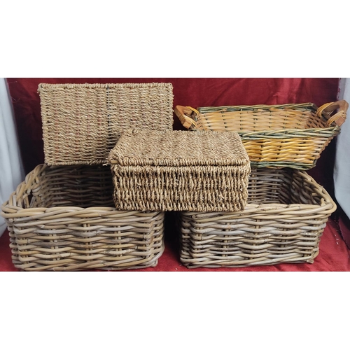 163 - An assortment of wicker storage baskets.