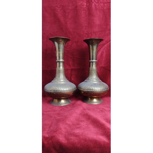 185 - A pair of large vintage decorative brass vases, each measuring approx 27cm.