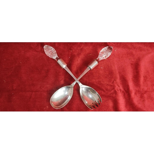 193 - A pair of vintage silver plated salad servers.