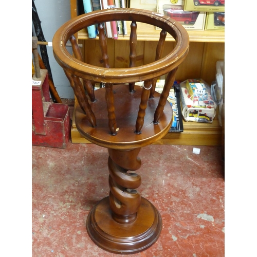 204 - A vintage wooden plant stand. Measuring 68cm tall.