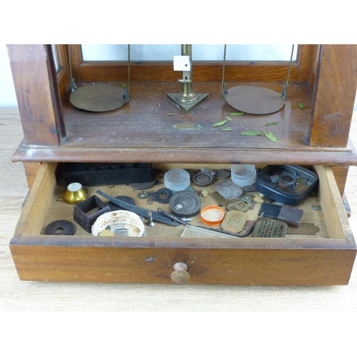 214 - A cased set of vintage/ antique chemist scales.