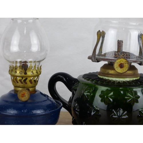 226 - A vintage 'Pixie' oil lamp & finger lamp with green glass base.