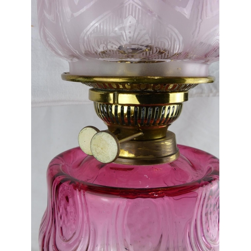 229 - A stunning antique/ Victorian oil lamp with brass base, decorative Ruby glass font & etched Ruby gla... 