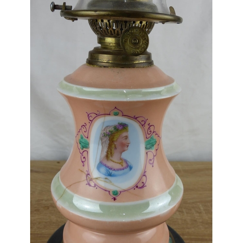 230 - A stunning antique oil lamp with ceramic base (a/f) and hand painted portraits, along with decorativ... 