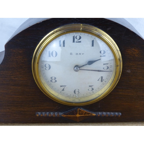 240 - A vintage/ antique French 8 day clock in wood case.