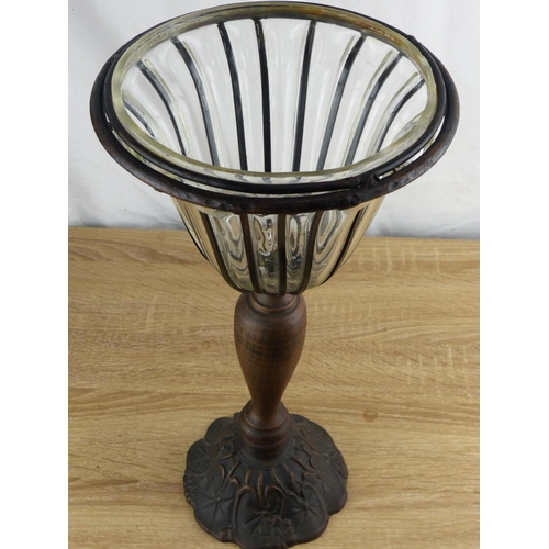 270 - A metal, wood and glass vase / candleholder. Measuring 39cm in length.