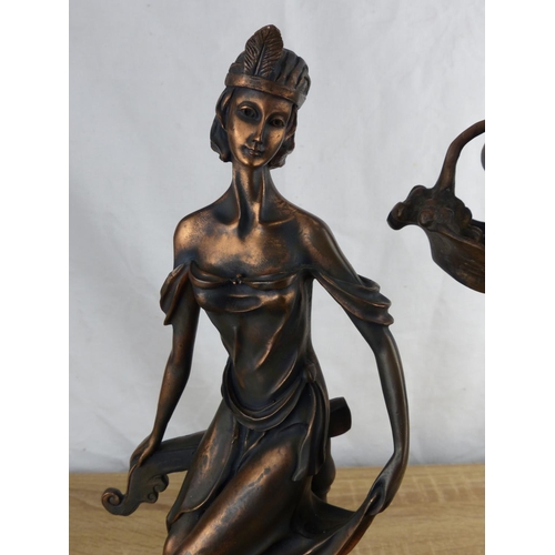 277 - A bronze statuette of a flower girl measuring 42cm tall and a bronze effect art deco flapper girl, m... 