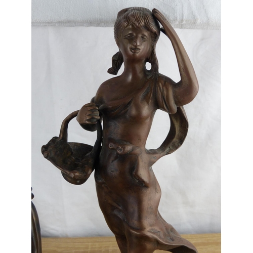 277 - A bronze statuette of a flower girl measuring 42cm tall and a bronze effect art deco flapper girl, m... 