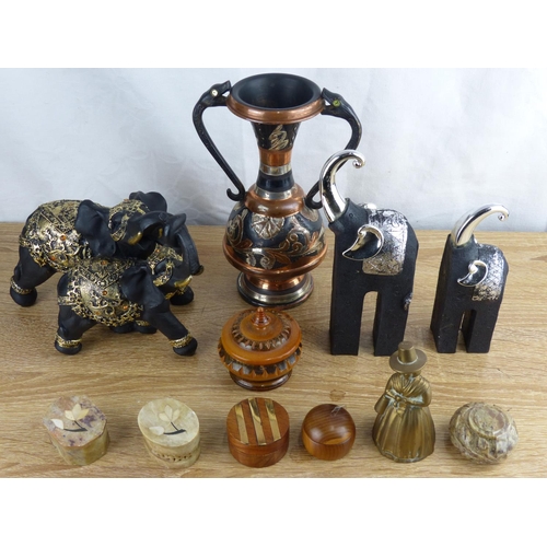 281 - A collection of various items to include carved wooden elephants, trinket boxes & more.