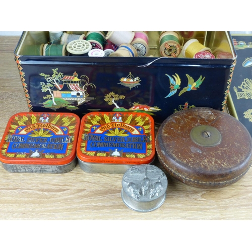 290 - An assortment of vintage tins & sewing threads.