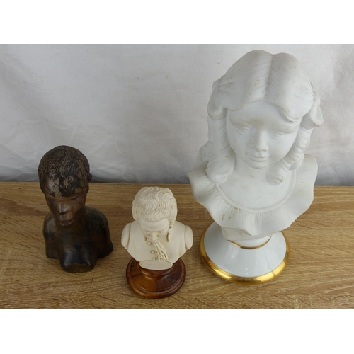 295 - An assortment of bust to include an hand carved African bust (approx 14cm), a Mozart Bust (approx 12... 