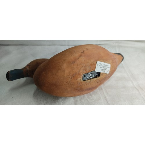 13 - A handmade decoy duck.