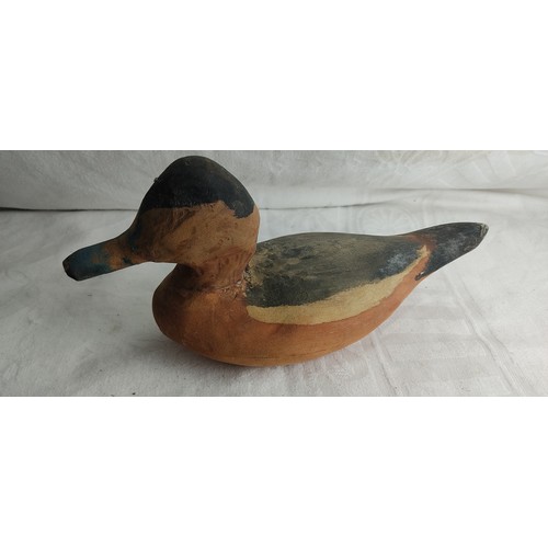 13 - A handmade decoy duck.