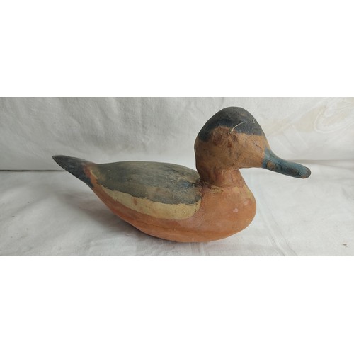 13 - A handmade decoy duck.