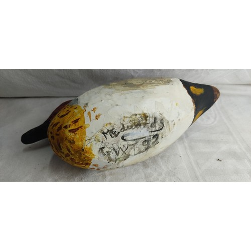 29 - A handmade decoy duck.