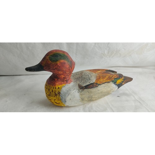 29 - A handmade decoy duck.