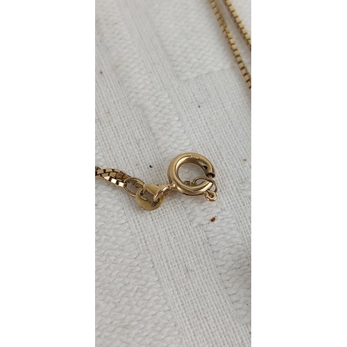 73 - A 9ct gold pendant with chain, weighing 3.65 grams.