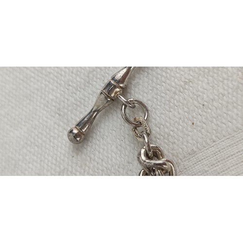 95 - A Sterling Silver Albert chain with T-Bar. Weighing 31.29 grams.