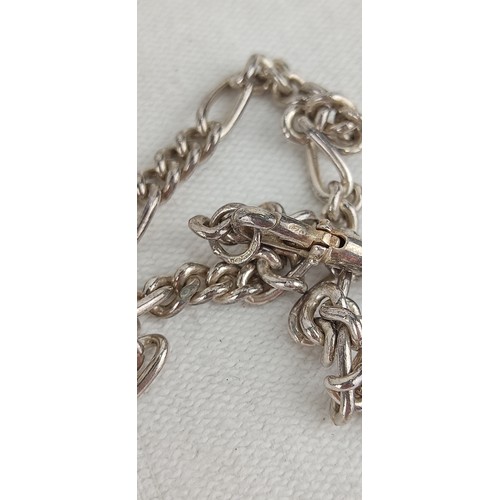 95 - A Sterling Silver Albert chain with T-Bar. Weighing 31.29 grams.