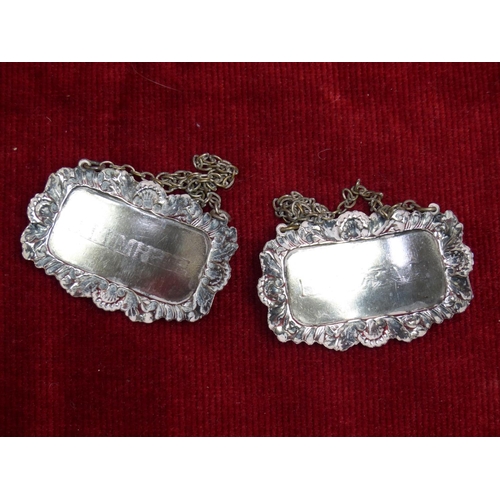 424 - Two vintage silver plated whiskey decanter labels 'Bushmills' and 'Black Bush'.