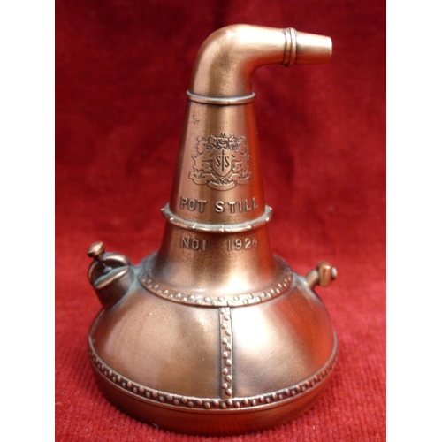 429 - An unusual copper paperweight in the style of a whiskey pot still decanter, inscribed Pot Still No 1... 