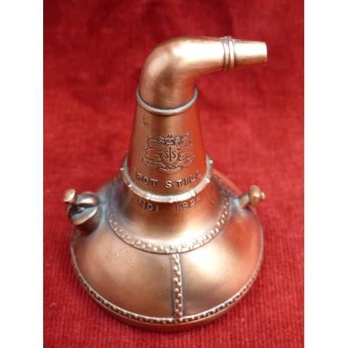 429 - An unusual copper paperweight in the style of a whiskey pot still decanter, inscribed Pot Still No 1... 