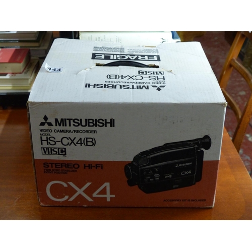 444 - A Mitsubishi video camera/recorder, model HS-CX4(B) in original box.