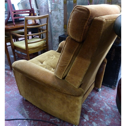 450 - A vintage Parker Knoll reclining armchair with gold velvet upholstery.